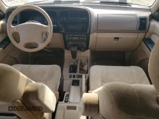 2000 Isuzu Trooper S with VIN JACDJ58X6Y7J06807, listed as a Copart auction lot 79179454 with 157,308 mi miles and Salvage title. Bid and sale history available at DreamBid. Image 8.