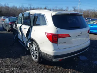2017 Honda Pilot Touring with VIN 5FNYF6H98HB102313, listed as a IAAI auction lot 41244311 with 106,931 mi miles. Bid and sale history available at carsss.com. Image 3.