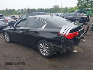 2014 Infiniti Q50 Premium z VIN JN1BV7AR4EM695232, wystawiony jako IAAI lot #42367581 z przebiegiem 138 063 mil mil oraz . Historia ofert i sprzedaży dostępna na DreamBid. Obrazek 14.