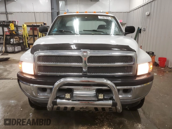 1999 Dodge Ram 2500 with VIN 1B7KF23W2XJ512012, listed as a Copart auction lot 77487064 with 151,465 mi miles and Clean Title. Bid and sale history available at carsss.com. Image 5.