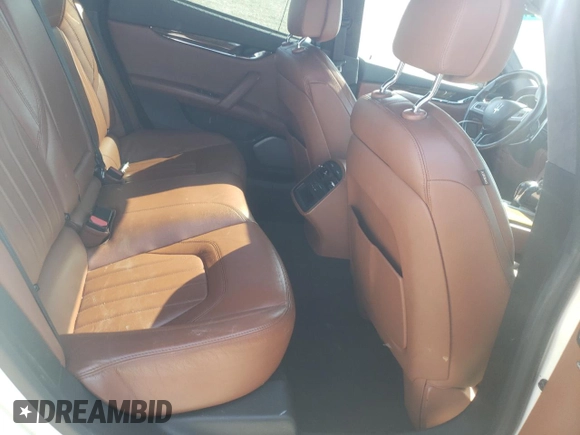 2014 Maserati Quattroporte GTS z VIN ZAM56PPA3E1074957, wystawiony jako Copart lot #52321115 z przebiegiem 113 584 mil mil oraz Szkoda całkowita • Salvage title. Historia ofert i sprzedaży dostępna na DreamBid. Obrazek 10.