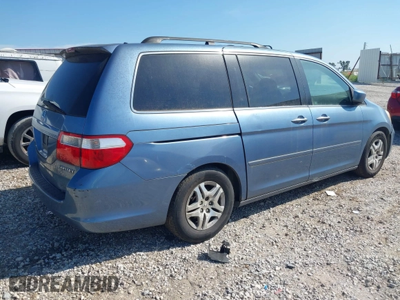 2005 Honda Odyssey EX with VIN 5FNRL38465B059893, listed as a IAAI auction lot 42790058 with 257,143 mi miles and . Bid and sale history available at DreamBid. Image 4.