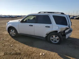 2009 Ford Escape XLS with VIN 1FMCU92729KD10213, listed as a Copart auction lot 48704425 with 114,219 mi miles and Salvage title. Bid and sale history available at DreamBid. Image 2.