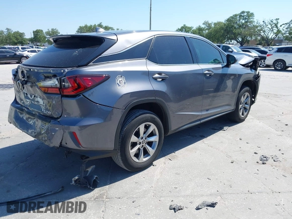 2019 Lexus RX with VIN 2T2ZZMCA0KC132043, listed as a IAAI auction lot 42001021 with 23,663 mi miles. Bid and sale history available at carsss.com. Image 4.