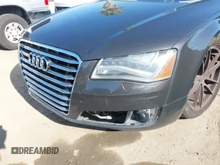 2011 Audi A8 with VIN WAURVAFD9BN014362, listed as a IAAI auction lot 41960366 with 135,244 mi miles and . Bid and sale history available at DreamBid. Image 6.