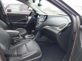 2013 Hyundai Santa Fe Sport z VIN 5XYZU3LA4DG085412, wystawiony jako IAAI lot #42016302 z przebiegiem 121 484 mil mil oraz . Historia ofert i sprzedaży dostępna na DreamBid. Obrazek 5.