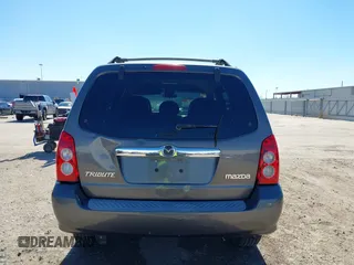 2005 Mazda Tribute S with VIN 4F2CZ06175KM49643, listed as a IAAI auction lot 41397843 with 185,088 mi miles and . Bid and sale history available at carsss.com. Image 16.