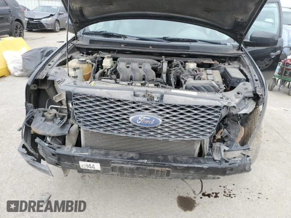2006 Ford Freestyle SE z VIN 1FMZK01126GA23929, wystawiony jako Copart lot #48056535 z przebiegiem 217 022 mil mil oraz Szkoda całkowita • Salvage title. Historia ofert i sprzedaży dostępna na DreamBid. Obrazek 13.