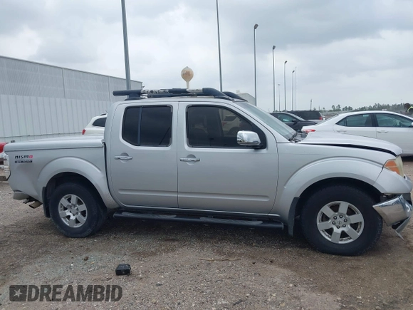 2005 Nissan Frontier LE with VIN 1N6AD07U25C457977, listed as a IAAI auction lot 41906592 with 256,116 mi miles and . Bid and sale history available at DreamBid. Image 14.
