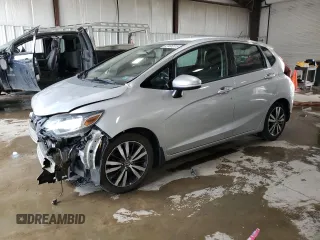2015 Honda Fit EX-L with VIN 3HGGK5H87FM737610, listed as a Copart auction lot 62466515 with 103,454 mi miles and Salvage title. Bid and sale history available at DreamBid. Image 1.
