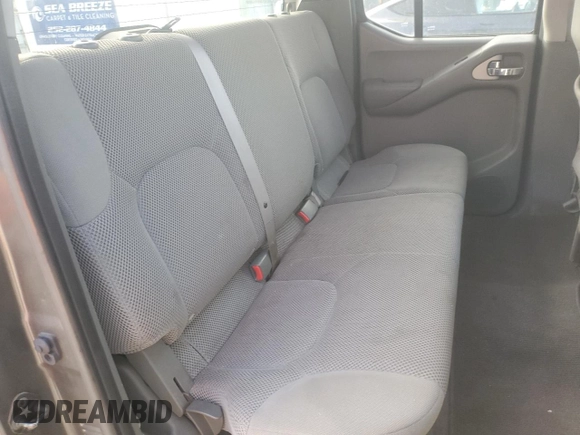 2009 Nissan Frontier SE z VIN 1N6AD09W69C423948, wystawiony jako Copart lot #50600545 z przebiegiem 221 181 mil mil oraz Czysty tytuł • Clean title. Historia ofert i sprzedaży dostępna na DreamBid. Obrazek 10.