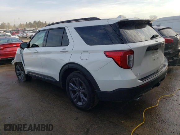 2022 Ford Explorer XLT with VIN 1FMSK8DH9NGC15548, listed as a Copart auction lot 77819694 with 23,087 mi miles and Salvage Title. Bid and sale history available at DreamBid. Image 2.