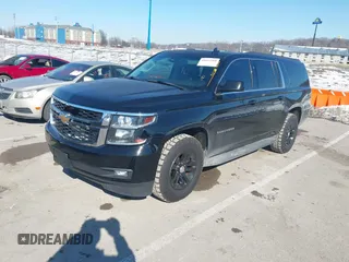 2015 Chevrolet Suburban LT with VIN 1GNSKJKC8FR687191, listed as a IAAI auction lot 41653268 with 193,885 mi miles. Bid and sale history available at carsss.com. Image 2.