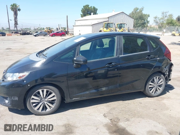2015 Honda Fit EX-L z VIN 3HGGK5H88FM706513, wystawiony jako IAAI lot #42493772 z przebiegiem 173 129 mil mil oraz . Historia ofert i sprzedaży dostępna na DreamBid. Obrazek 15.
