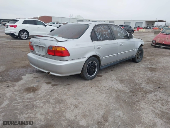 1999 Honda Civic EX with VIN 1HGEJ8649XL023282, listed as a IAAI auction lot 41496406 with 229,003 mi miles. Bid and sale history available at carsss.com. Image 4.