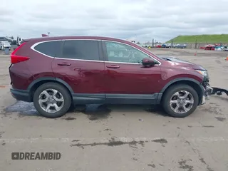 2019 Honda CR-V EX with VIN 7FARW2H56KE053022, listed as a IAAI auction lot 41848570 with 128,676 mi miles. Bid and sale history available at carsss.com. Image 14.