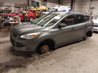 2014 Ford Escape SE with VIN 1FMCU9GX8EUD55597, listed as a IAAI auction lot 41870023 with 150,889 mi miles. Bid and sale history available at carsss.com. Image 2.