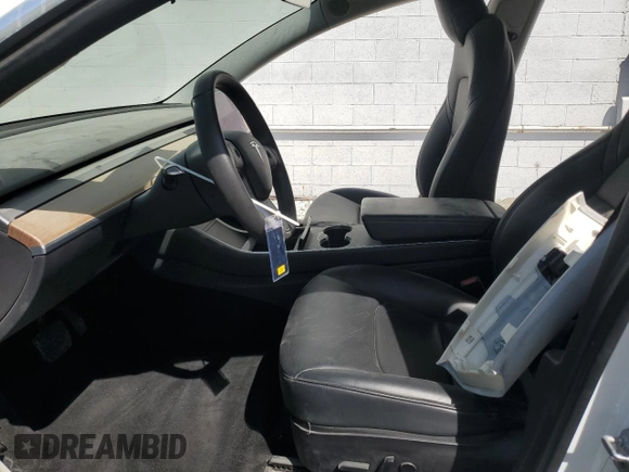 2020 Tesla Model 3 Standard Range Plus with VIN 5YJ3E1EA5LF612626, listed as a Copart auction lot 54421235 with Not Provided miles and Clean Title. Bid and sale history available at DreamBid. Image 7.