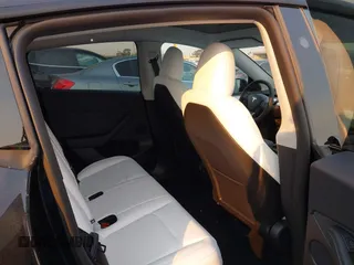 2025 Tesla Model Y Long Range with VIN 7SAYGDED5SF281818, listed as a IAAI auction lot 41302611 with 395 mi miles and . Bid and sale history available at DreamBid. Image 8.