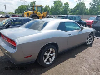 2013 Dodge Challenger SXT с VIN 2C3CDYAG7DH675121, выставлен на аукционе IAAI как лот 42623166 с пробегом 189 604 миль миль и . История ставок и продаж доступна на DreamBid. Изображение 4.