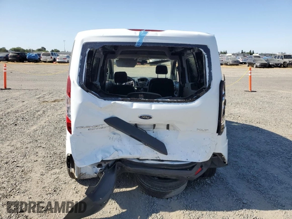 2014 Ford Transit Connect XLT with VIN NM0LE7F71E1140133, listed as a Copart auction lot 58371725 with 55,121 mi miles and Salvage title. Bid and sale history available at DreamBid. Image 6.