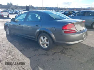 2005 Dodge Stratus SXT z VIN 1B3EL46R25N516995, wystawiony jako IAAI lot #41059297 z przebiegiem 88 864 mil mil oraz . Historia ofert i sprzedaży dostępna na DreamBid. Obrazek 3.