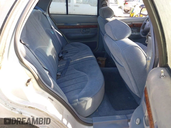 1997 Mercury Grand Marquis GS z VIN 2MELM74W6VX625065, wystawiony jako IAAI lot #42055672 z przebiegiem 125 494 mil mil oraz . Historia ofert i sprzedaży dostępna na DreamBid. Obrazek 8.