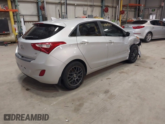 2013 Hyundai Elantra GT with VIN KMHD35LE3DU151891, listed as a IAAI auction lot 41869397 with 84,692 mi miles. Bid and sale history available at carsss.com. Image 4.