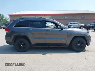 2015 Jeep Grand Cherokee Altitude with VIN 1C4RJFAG5FC710943, listed as a IAAI auction lot 42430708 with 163,776 mi miles and . Bid and sale history available at DreamBid. Image 13.