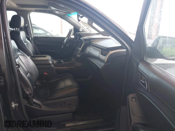 2015 Chevrolet Tahoe LT with VIN 1GNSCBKC5FR105437, listed as a IAAI auction lot 42052084 with 348,093 mi miles and . Bid and sale history available at DreamBid. Image 5.