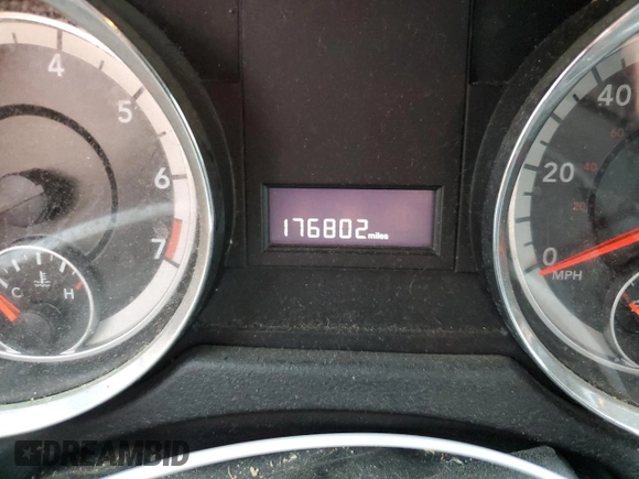 2015 Dodge Grand Caravan American Value with VIN 2C4RDGBG6FR659777, listed as a Copart auction lot 53847385 with 176,802 mi miles and Salvage Title. Bid and sale history available at DreamBid. Image 9.