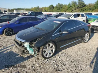 2014 Cadillac ELR z VIN 1G6RL1E4XEU602018, wystawiony jako Copart lot #74824784 z przebiegiem 90 159 mil mil oraz Tytuł czysty. Historia ofert i sprzedaży dostępna na DreamBid. Obrazek 1.