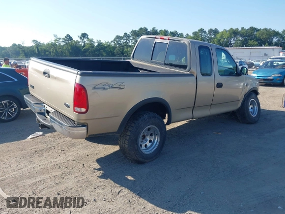 2000 Ford F-150 XL z VIN 1FTRX18W7YNA73804, wystawiony jako IAAI lot #42779753 z przebiegiem 228 666 mil mil oraz . Historia ofert i sprzedaży dostępna na DreamBid. Obrazek 4.