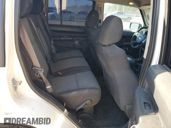 2010 Jeep Commander Sport with VIN 1J4RH4GK9AC113888, listed as a Copart auction lot 84553544 with 208,109 mi miles and Salvage title. Bid and sale history available at DreamBid. Image 11.