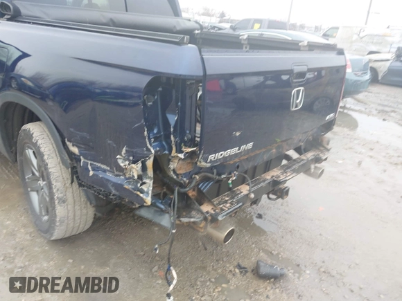 2022 Honda Ridgeline RTL-E with VIN 5FPYK3F72NB036226, listed as a IAAI auction lot 41706285 with 30,869 mi miles and . Bid and sale history available at DreamBid. Image 6.