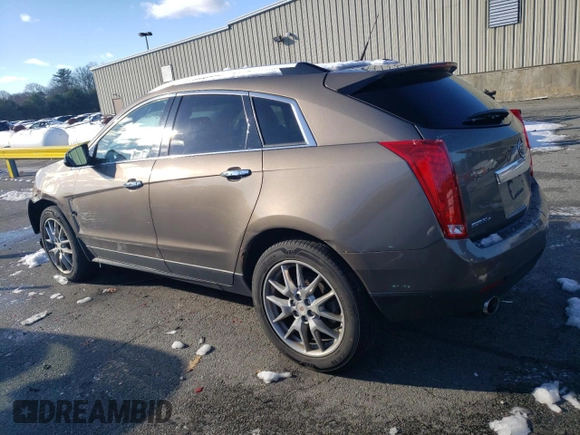 2014 Cadillac SRX Premium Collection z VIN 3GYFNGE37ES566089, wystawiony jako Copart lot #83595454 z przebiegiem 209 155 mil mil oraz Szkody całkowita. Historia ofert i sprzedaży dostępna na DreamBid. Obrazek 2.