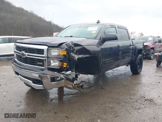 2015 Chevrolet Silverado 1500 LT with VIN 3GCUKRECXFG104194, listed as a IAAI auction lot 41029090 with 149,530 mi miles. Bid and sale history available at carsss.com. Image 2.