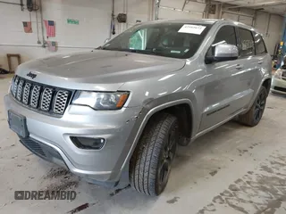 2018 Jeep Grand Cherokee Laredo E with VIN 1C4RJFAG7JC203793, listed as a IAAI auction lot 42585072 with 263,987 mi miles and . Bid and sale history available at DreamBid. Image 2.
