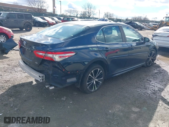 2018 Toyota Camry LE with VIN 4T1B11HK2JU598860, listed as a IAAI auction lot 41493633 with 74,480 mi miles. Bid and sale history available at carsss.com. Image 4.