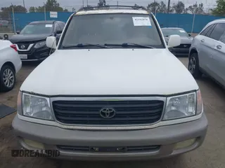 2001 Toyota Land Cruiser z VIN JTEHT05J412004663, wystawiony jako IAAI lot #42192078 z przebiegiem 358 917 mil mil oraz . Historia ofert i sprzedaży dostępna na DreamBid. Obrazek 12.