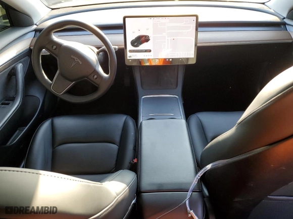 2021 Tesla Model 3 Standard Range Plus with VIN 5YJ3E1EA4MF997078, listed as a Copart auction lot 43040225 with 19,584 mi miles and Salvage Title. Bid and sale history available at carsss.com. Image 8.