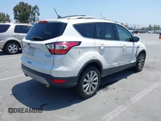 2018 Ford Escape Titanium with VIN 1FMCU0J94JUB26110, listed as a IAAI auction lot 42436285 with 59,586 mi miles and . Bid and sale history available at DreamBid. Image 4.