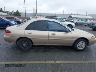 1997 Ford Escort LX with VIN 1FALP13P9VW292877, listed as a IAAI auction lot 41525166 with 91,154 mi miles. Bid and sale history available at carsss.com. Image 6.