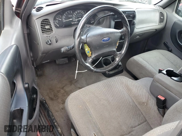 2002 Ford Ranger XL with VIN 1FTYR14V32TA65124, listed as a Copart auction lot 65009025 with 134,746 mi miles and Salvage title. Bid and sale history available at DreamBid. Image 8.