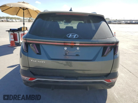 2022 Hyundai Tucson SEL with VIN 5NMJB3AE4NH133264, listed as a Copart auction lot 77479414 with 5,881 mi miles and Salvage Title. Bid and sale history available at carsss.com. Image 6.