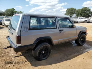 2000 Jeep Cherokee SE with VIN 1J4FT27P6YL127419, listed as a Copart auction lot 74211284 with 199,078 mi miles and Clean title. Bid and sale history available at DreamBid. Image 3.