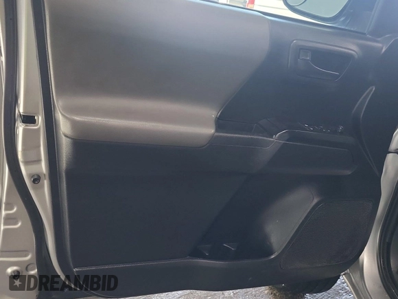 2019 Toyota Tacoma SR with VIN 5TFRX5GN1KX143485, listed as a IAAI auction lot 42763045 with 90,847 mi miles and . Bid and sale history available at DreamBid. Image 12.