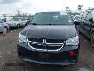 2017 Dodge Grand Caravan SE z VIN 2C4RDGBG0HR605507, wystawiony jako IAAI lot #42168499 z przebiegiem 169 422 mil mil oraz . Historia ofert i sprzedaży dostępna na DreamBid. Obrazek 12.