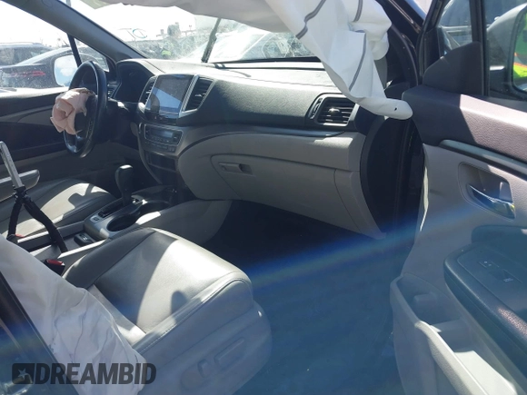 2016 Honda Pilot EX-L with VIN 5FNYF6H53GB048317, listed as a IAAI auction lot 41826297 with 127,672 mi miles. Bid and sale history available at carsss.com. Image 5.