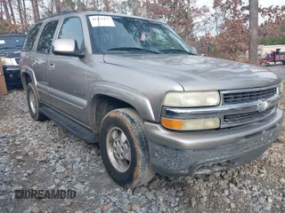2002 Chevrolet Tahoe LS z VIN 1GNEC13Z22R197594, wystawiony jako IAAI lot #41475477 z przebiegiem 384 968 mil mil oraz . Historia ofert i sprzedaży dostępna na DreamBid. Obrazek 1.